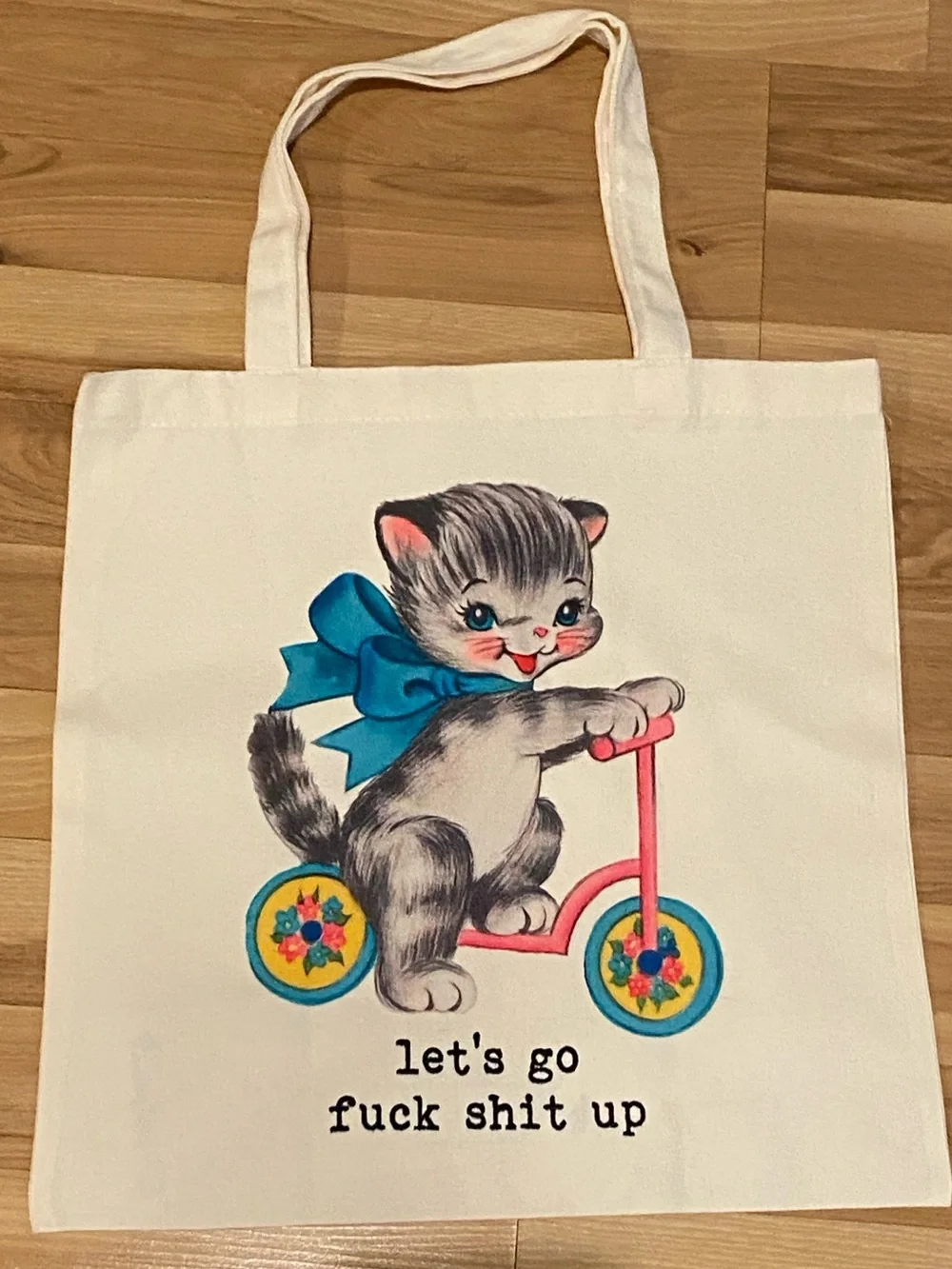 Vintage-Style Cat on Scooter Canvas tote bag